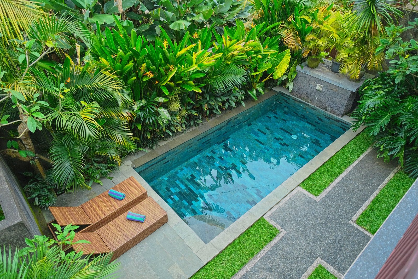 Cahyana House private pool seen from above, with sunbeds and tropical garden