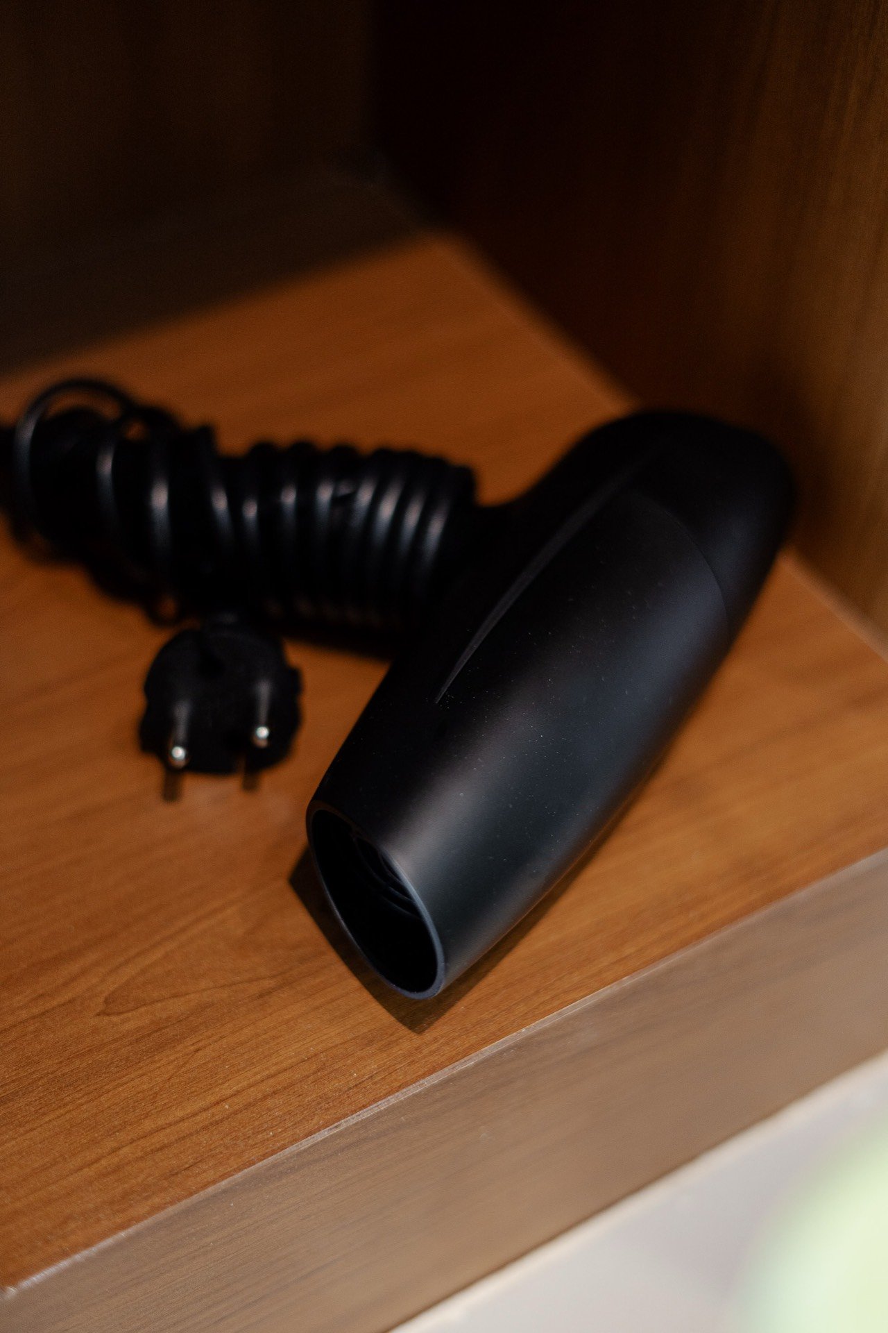 Cahyana Tibuah - the hair dryer in the bathroom