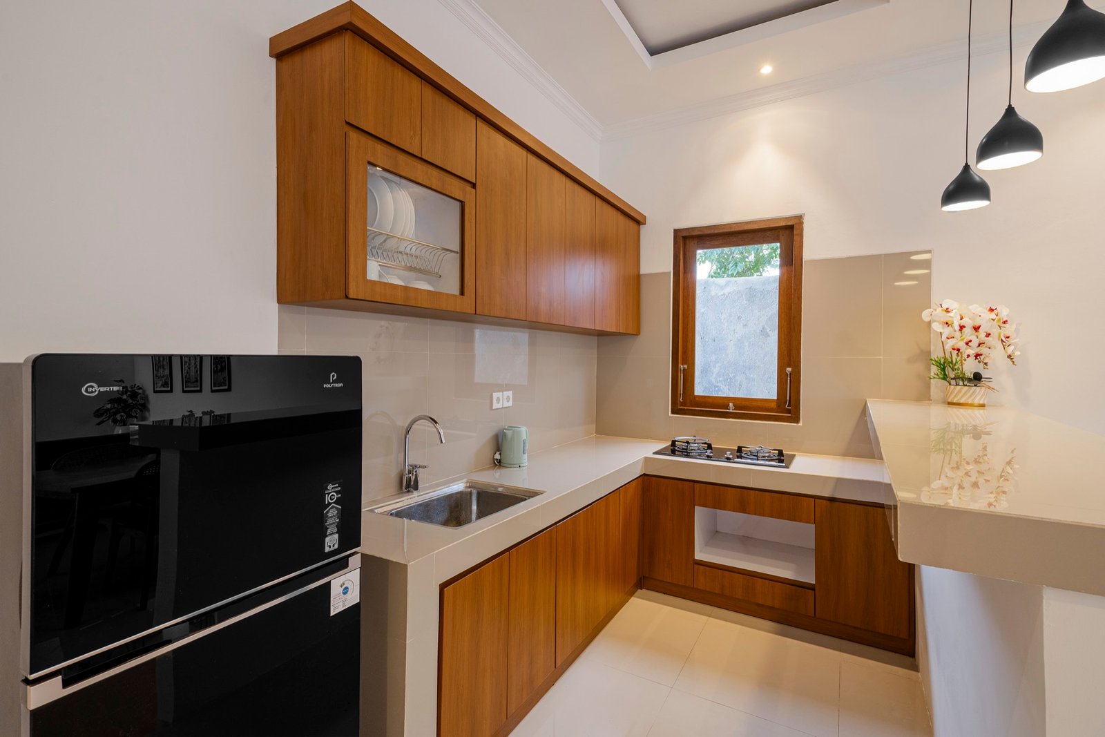 Cahyana Tibuah - the kitchen cabinets and fridge