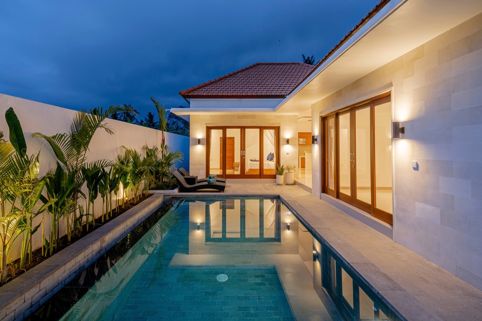 Cahyana Tibuah - the pool and palms at dusk (1)