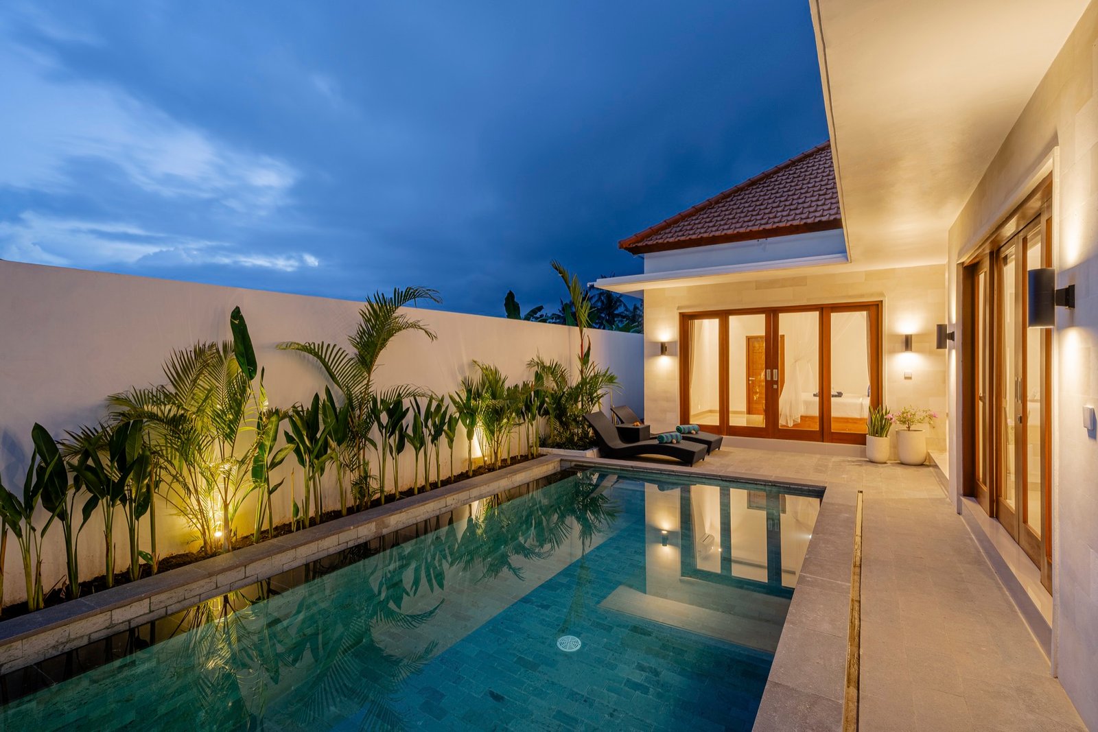 Cahyana Tibuah - the pool and palms at dusk (2)