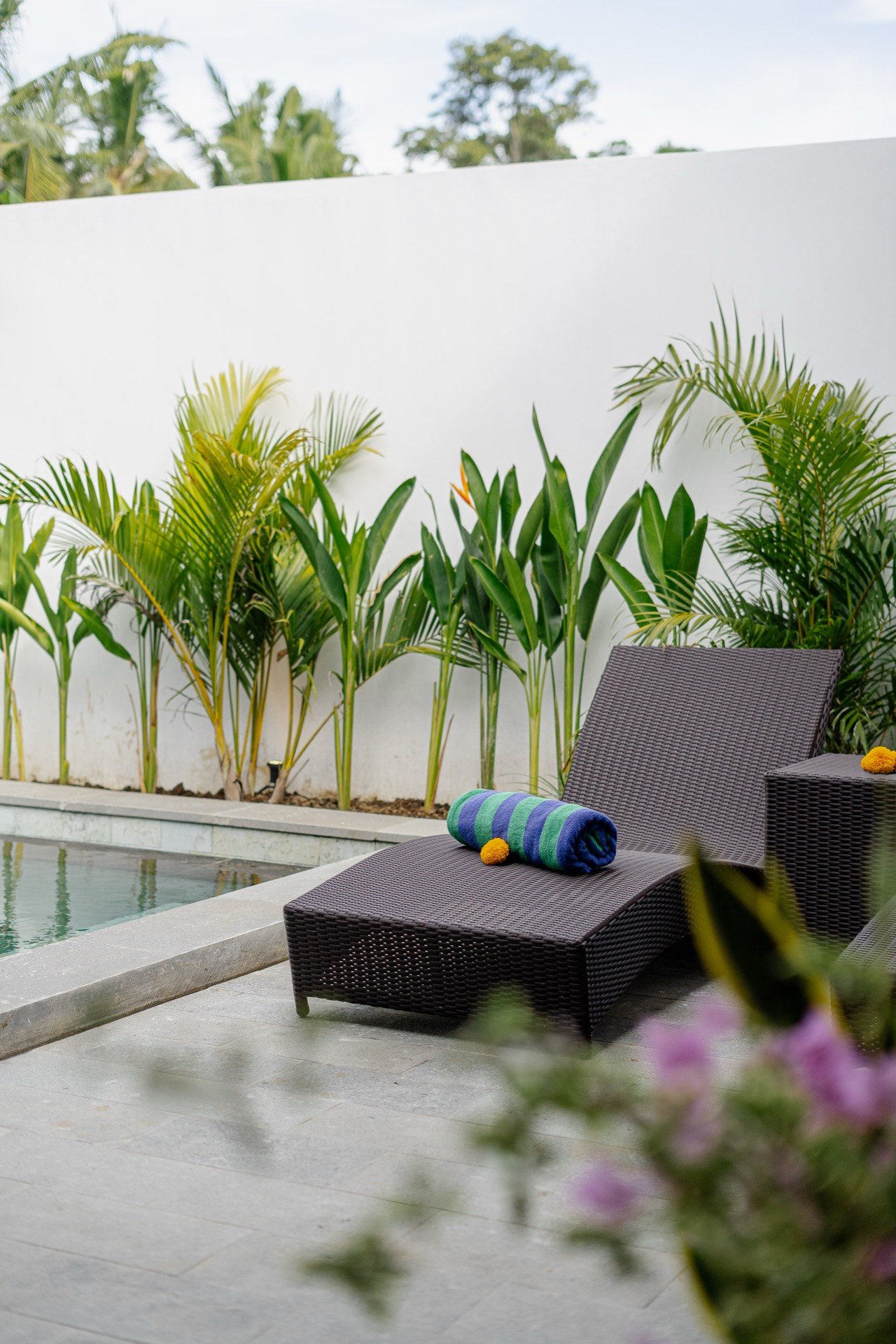 Cahyana Tibuah - a pair of sun loungers by the pool (2)