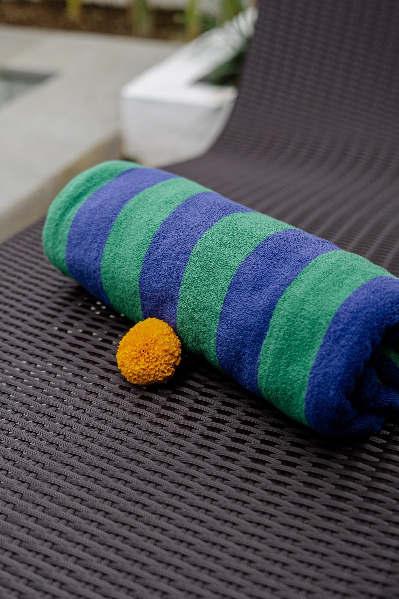 Cahyana Tibuah - a folded towel on a sun lounger